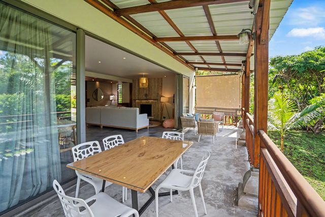 Outdoor dining table on the covered veranda
